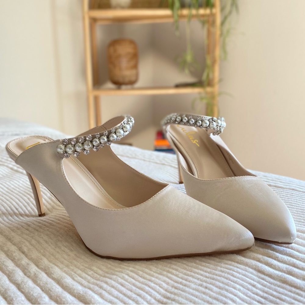 Lulu’s size 11, ivory satin pumps with pearls